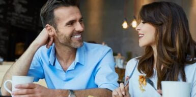 Man and woman in coffee talking as an example of the psychology of interruption